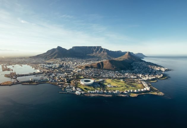 54739317 - aerial coastal view of cape town. view of cape town city with table mountain, cape town harbour, lion's head and devil's peak, south africa.